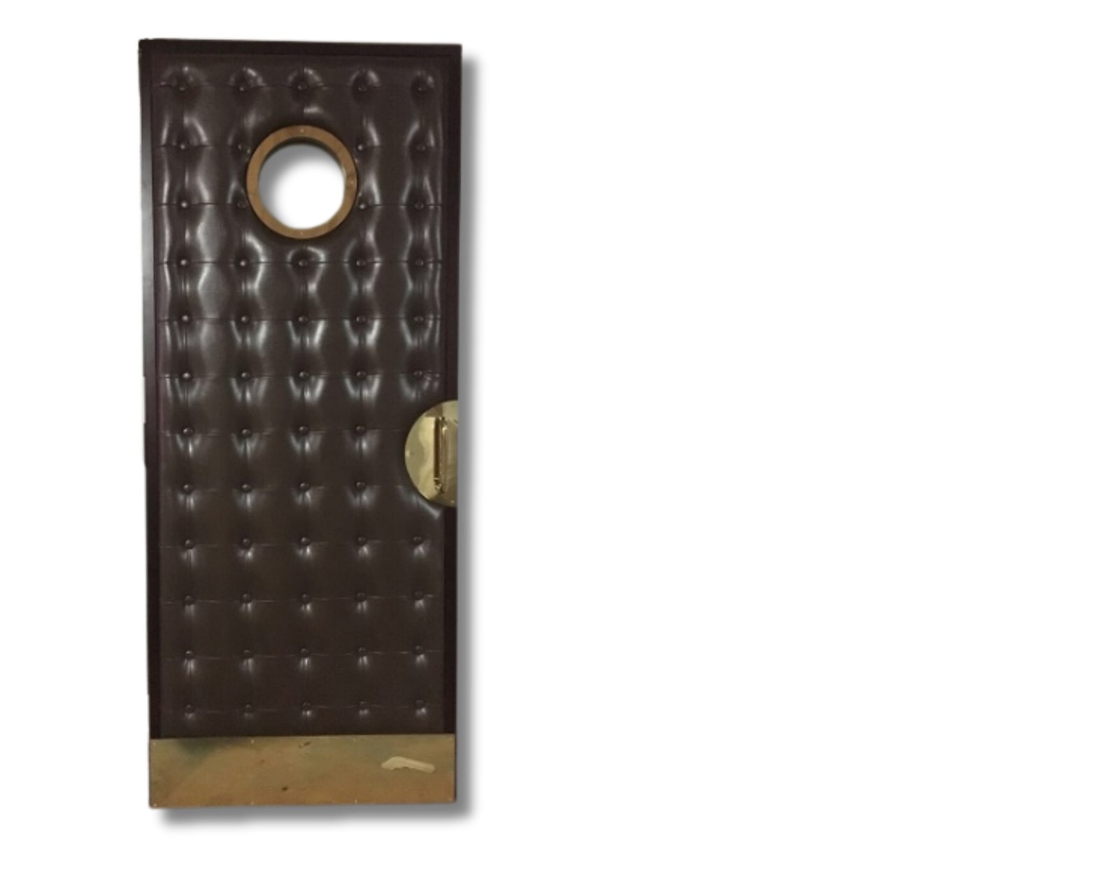 Brown vinyl diamond-tufted upholstered home theater door with a circular porthole window and decorative brass push and kick plates