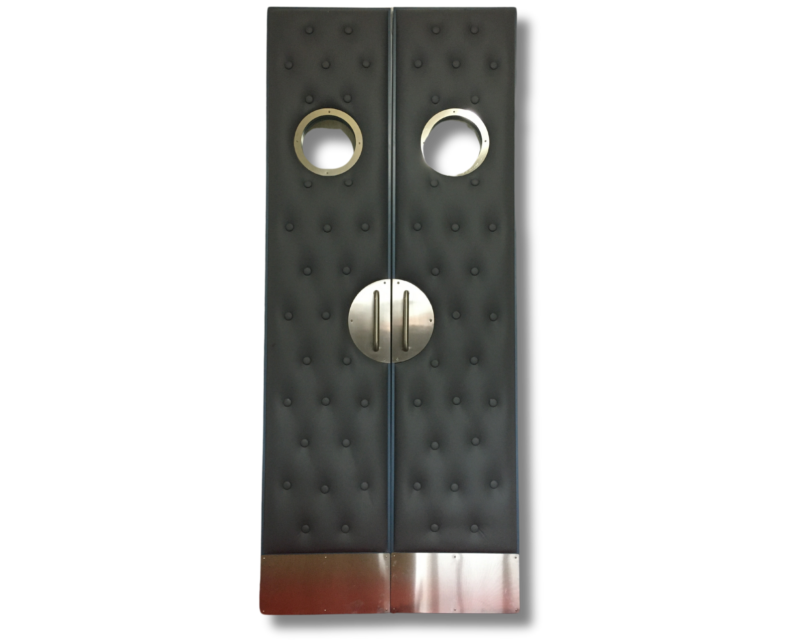 Custom acoustic double home theater doors with grey tufted upholstery, round porthole viewing windows, and modern silver pull hardware