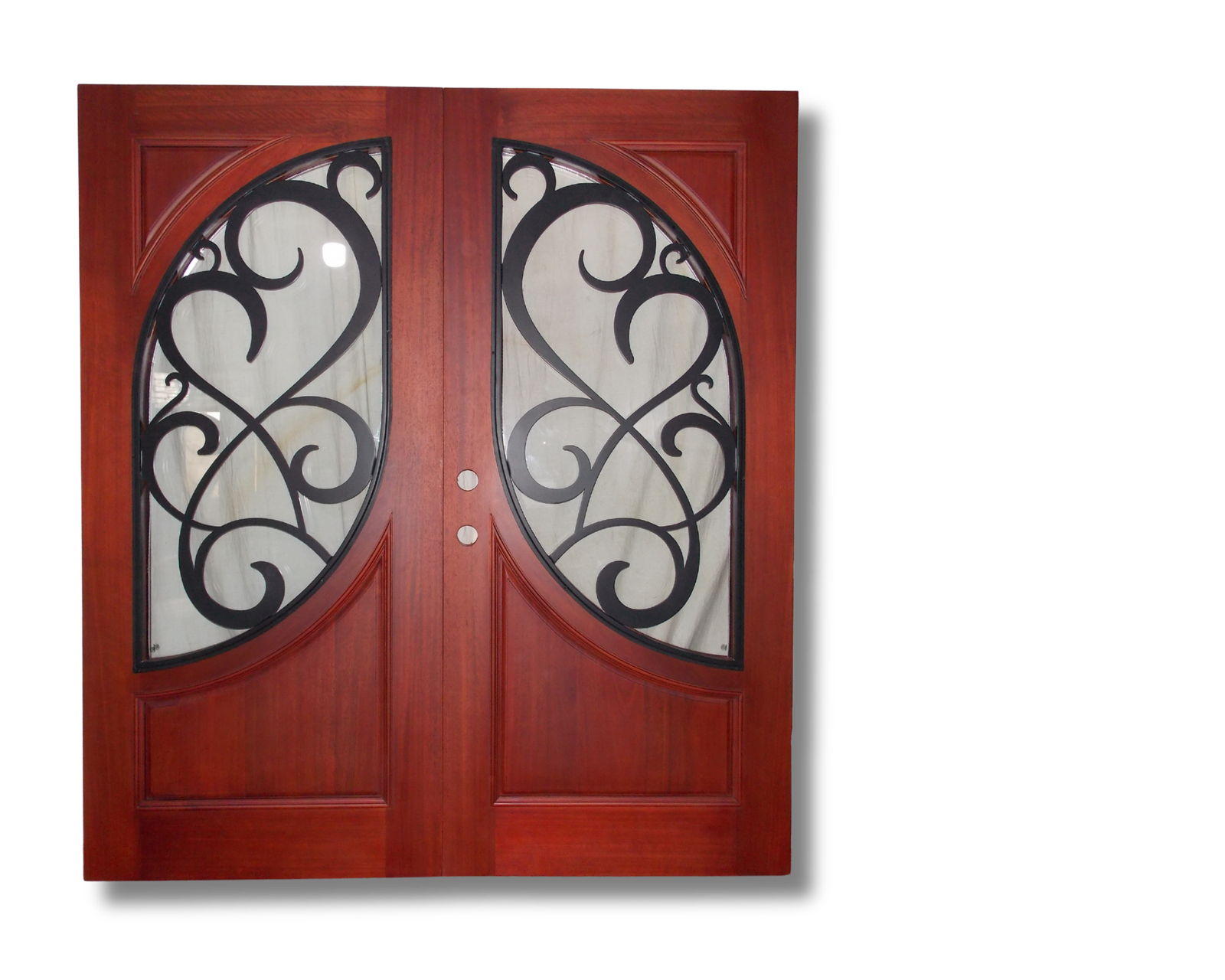 Custom mahogany solid wood double entry doors featuring oval glass panels with decorative black wrought iron scrollwork