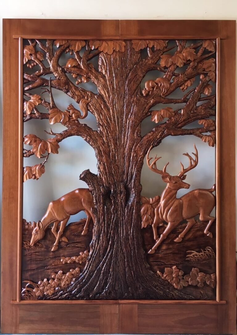 Uninstalled custom hand-carved solid wood double entry door panel showcasing detailed high-relief carvings of an oak tree, deer, and squirrels for a rustic craftsman home.
