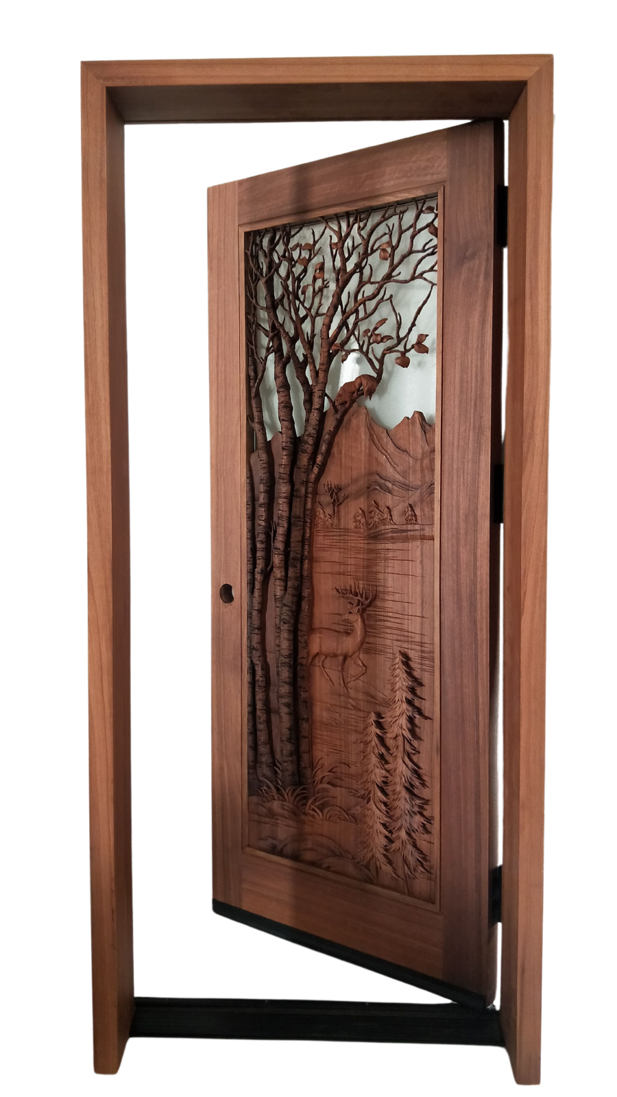 Aspen hand-carved solid wood custom entry door shown partially open, featuring high-relief carvings of tall aspen trees with leaves and squirrels, a deer by a mountain lake, pine trees, rocks and distant peaks; warm wood finish with glass panel by Crown Custom Doors