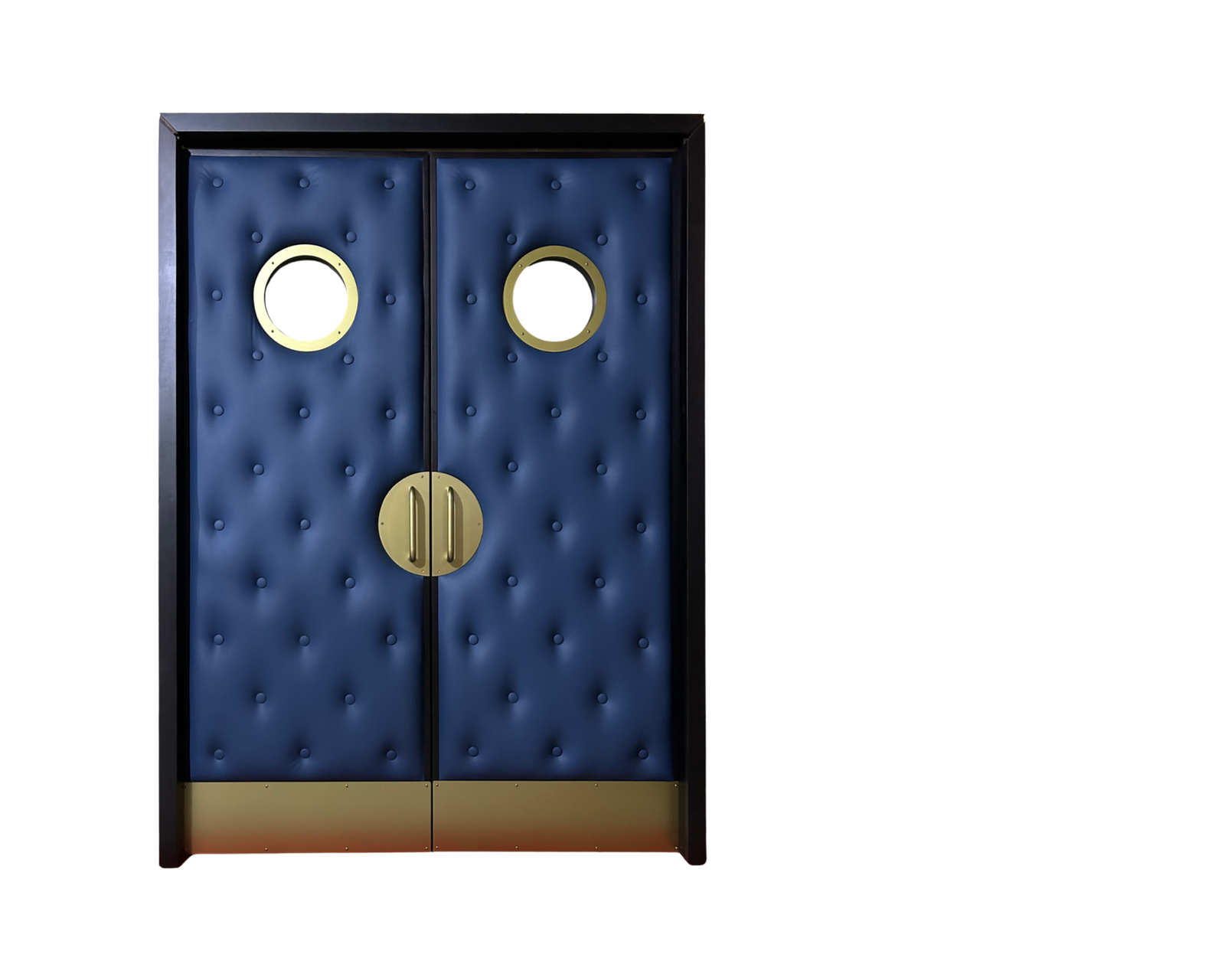 Studio product view on a clean black background showing custom navy blue button-tufted leather double home theater doors with champagne gold electroplated portholes, half-moon pull handles, and kick plates by Crown Custom Doors.