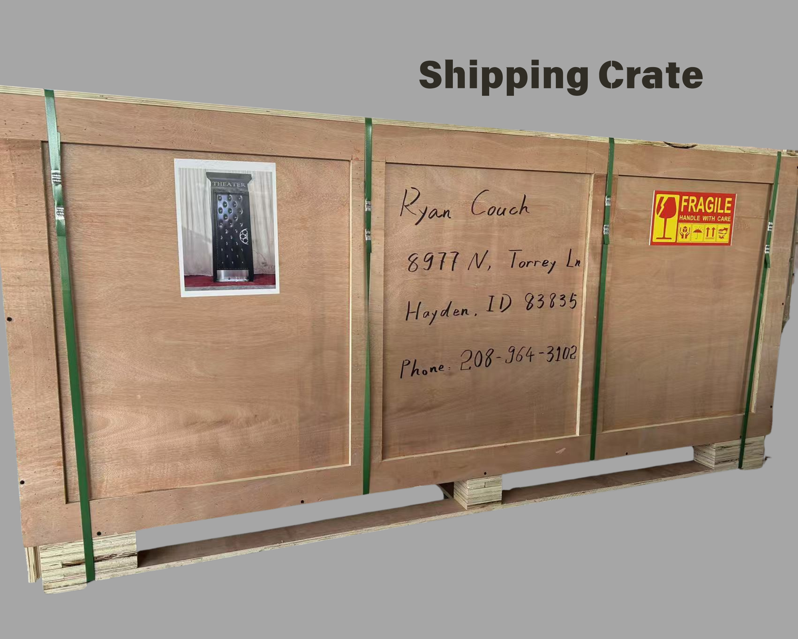Heavy-duty reinforced wooden crate package on a pallet base with high-tensile green banding and fragile labeling for secure global door freight delivery.