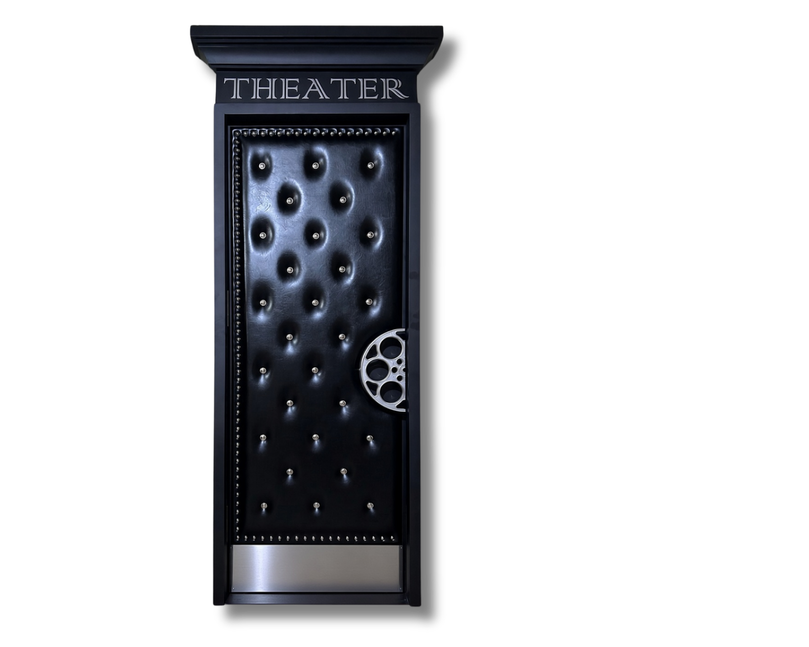 Single black diamond-tufted leather acoustic home theater door featuring an engraved THEATER header, custom film reel handle, silver studs, and kick plate by CROWNCUSTOMDOORS.
